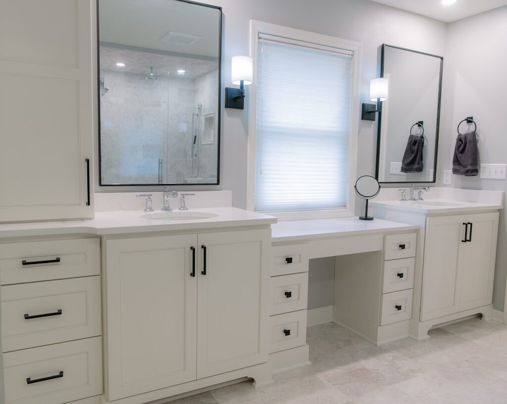 Minimalist bathroom design with white cabinet materials and double vanity