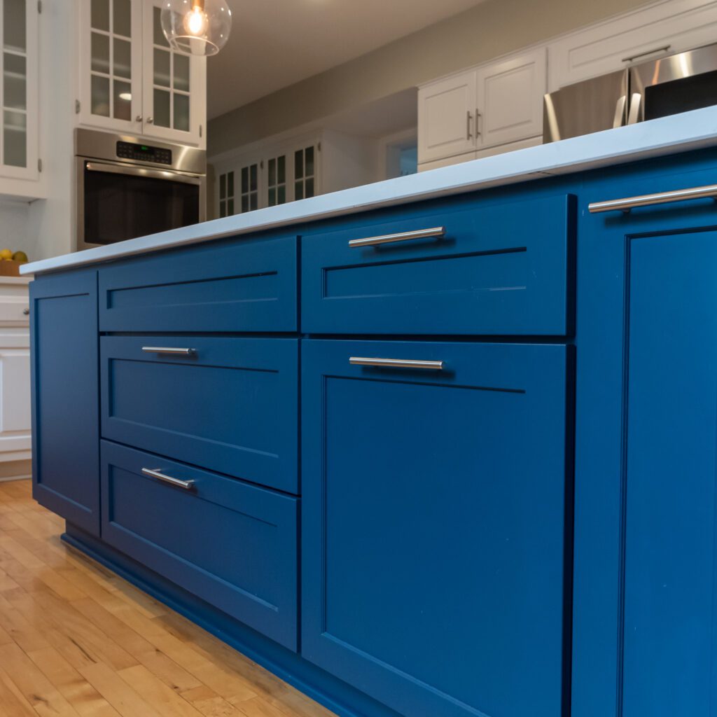 Closeup of blue cabinets on kitchen island