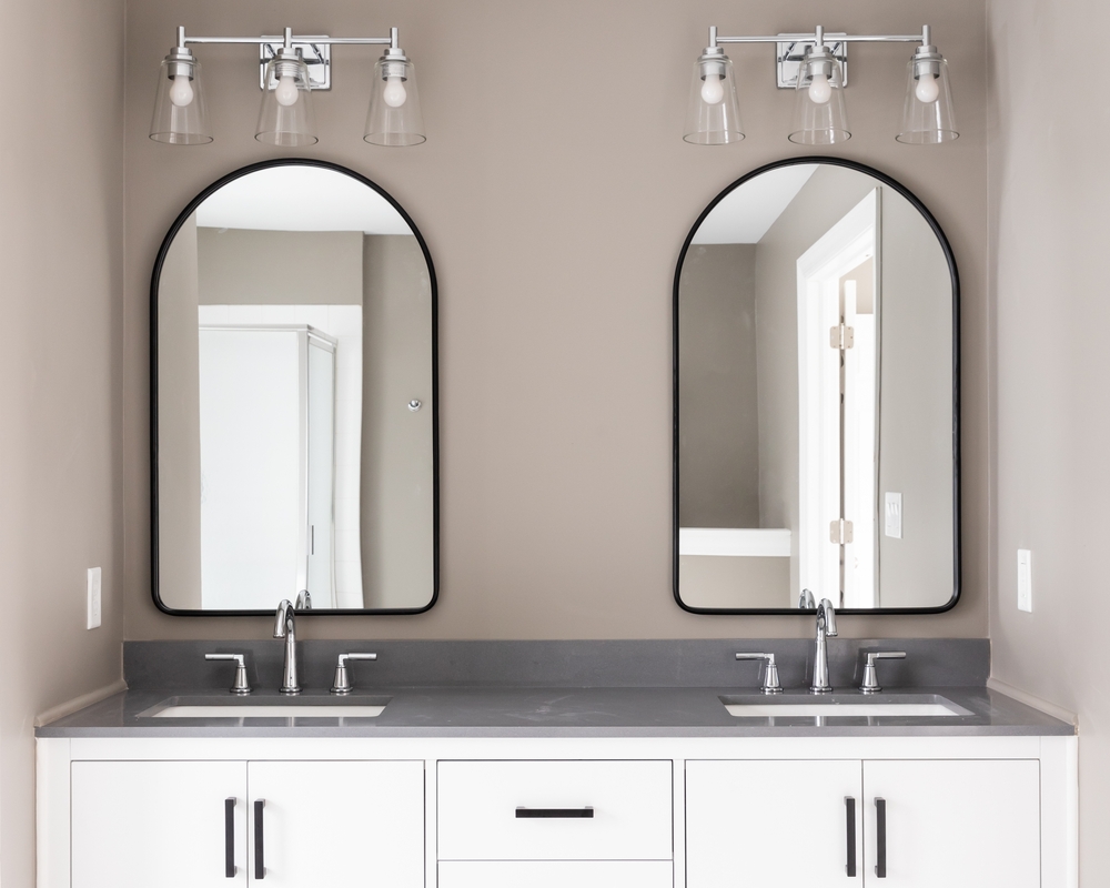 Differently shaped double vanity mirrors