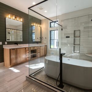 Luxurious master bathrooms with double vanity and large glass shower with tub inside