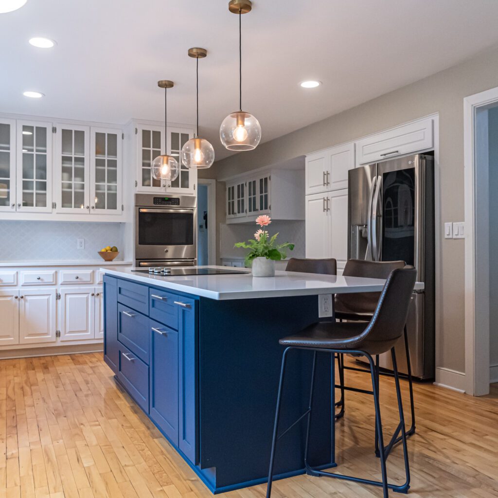 Two-toned kitchen cabinets with white on top and blue on the bottom. Luxury kitchen ideas