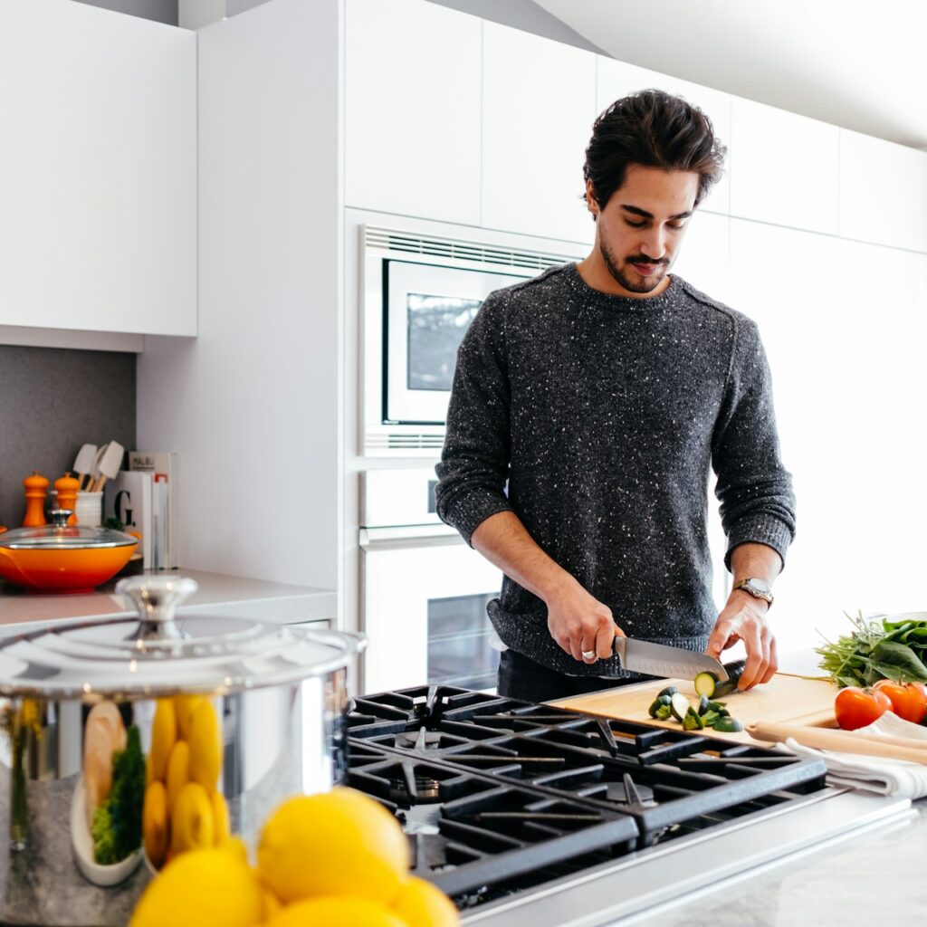 Man cooking in a chef's style kitchen