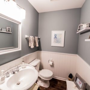 Gray small half bathroom ideas with white accents